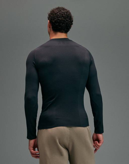 4505 – Svart, långärmad topp i seamless-design med muscle fit och definierande kompression, 4 av 5