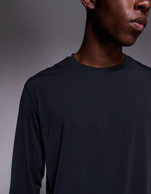 4505 – Svart, snabbtorkande, oversize löpartopp i nylon och mesh med långa ärmar, 5 av 5