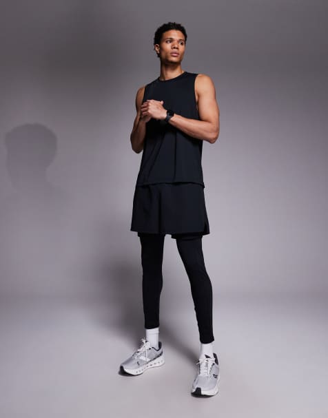 4505 – Svarta löpartights i snabbtorkande, reflekterande material med ficka för energigel - view 1