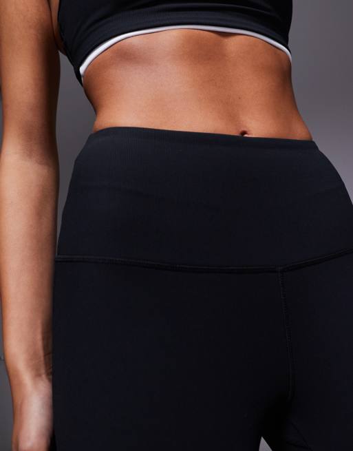 4505 – Svarta, mikroribbade yogaleggings i slim fit med hög midja och utsvängd design, 3 av 5