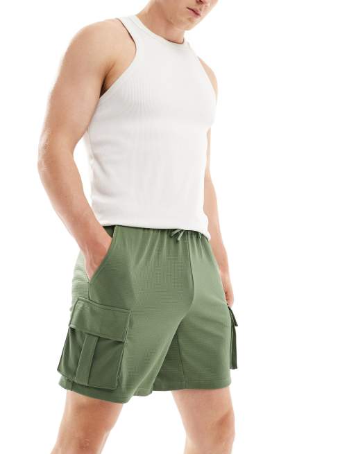 4505 - Technische jersey trainingsshort met cargozak in kaki