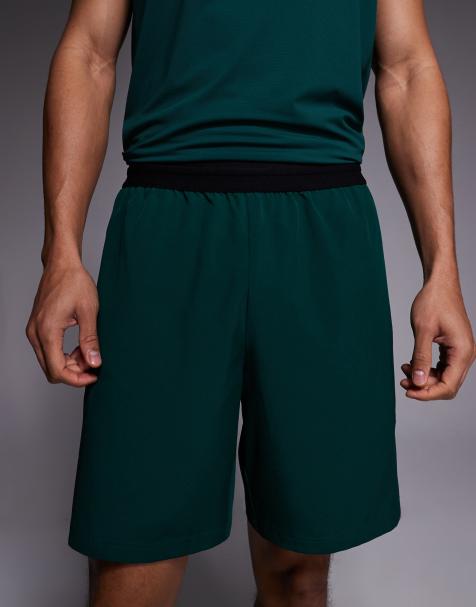 4505 – Trainingshorts aus Webstoff in Flaschengrün mit Elastikbund und Reißverschlusstaschen, 18 cm Schrittlänge - view 1