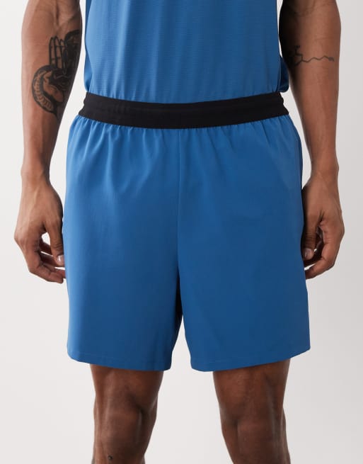4505 - Trainingsshort van 13 cm met handdoeklus en ritszakken in blauw, 5 van 5