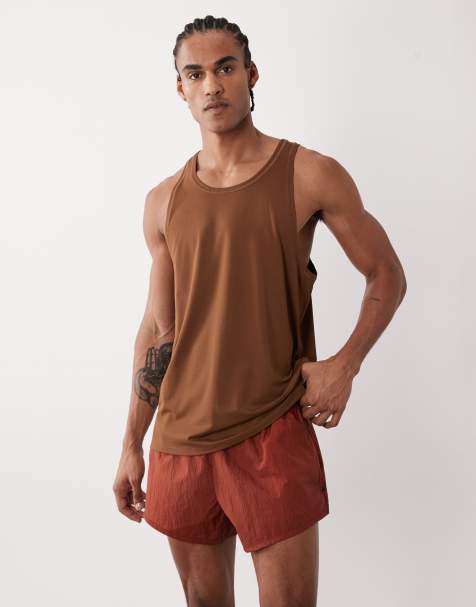 4505 - Trainingsshort van 8 cm technisch nylon met ritszakken in roestbruin - view 1