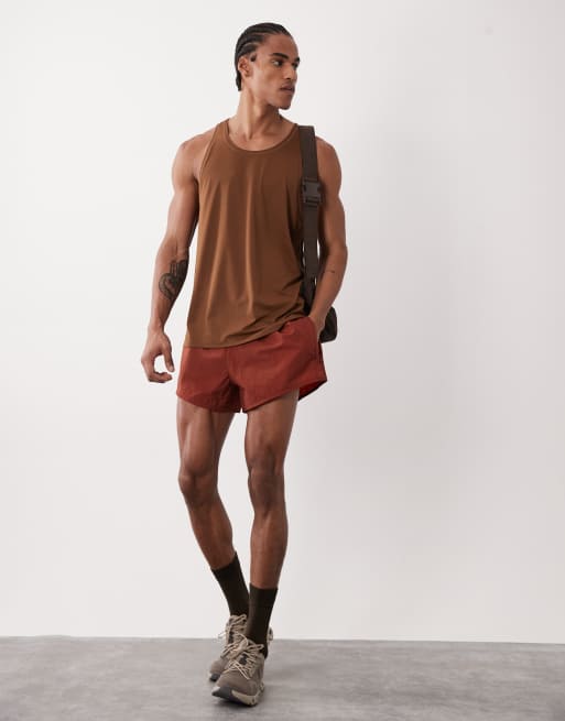 4505 - Trainingsshort van 8 cm technisch nylon met ritszakken in roestbruin, 2 van 5