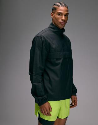 Ultraleichte Lauf-Windjacke in Schwarz mit kurzem Reißverschluss und Tasche vorne Schwarz M
