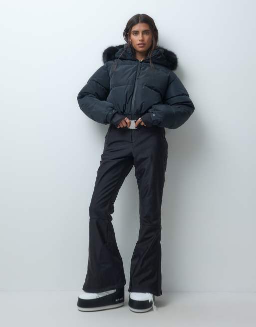 4505 vadderad softshell-skidräkt med markerad midja och huva i svart glans, 5 av 5
