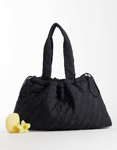 4505 woven logo quilted tote with adjustable toggle in black - view 1