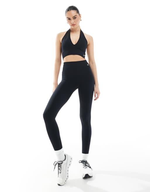 4th & Reckless - Coordinato nero senza cuciture con leggings, reggiseno sportivo allacciato al collo e reggiseno sportivo con scollo a vogatore