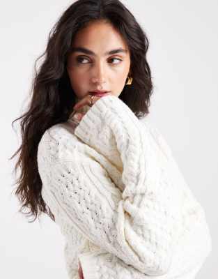 4th & Reckless Cotton Blend High Neck Cropped Roll Neck Cable Knit Sweater In White
