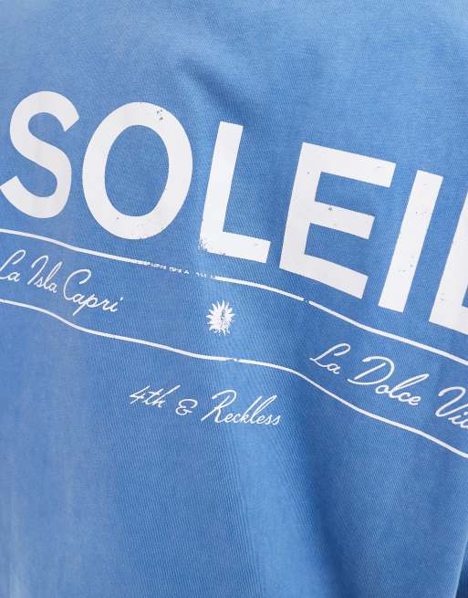 4th & Reckless - Forvasket blå T-shirt med 'Soleil'-print på ryggen, 2 af 4