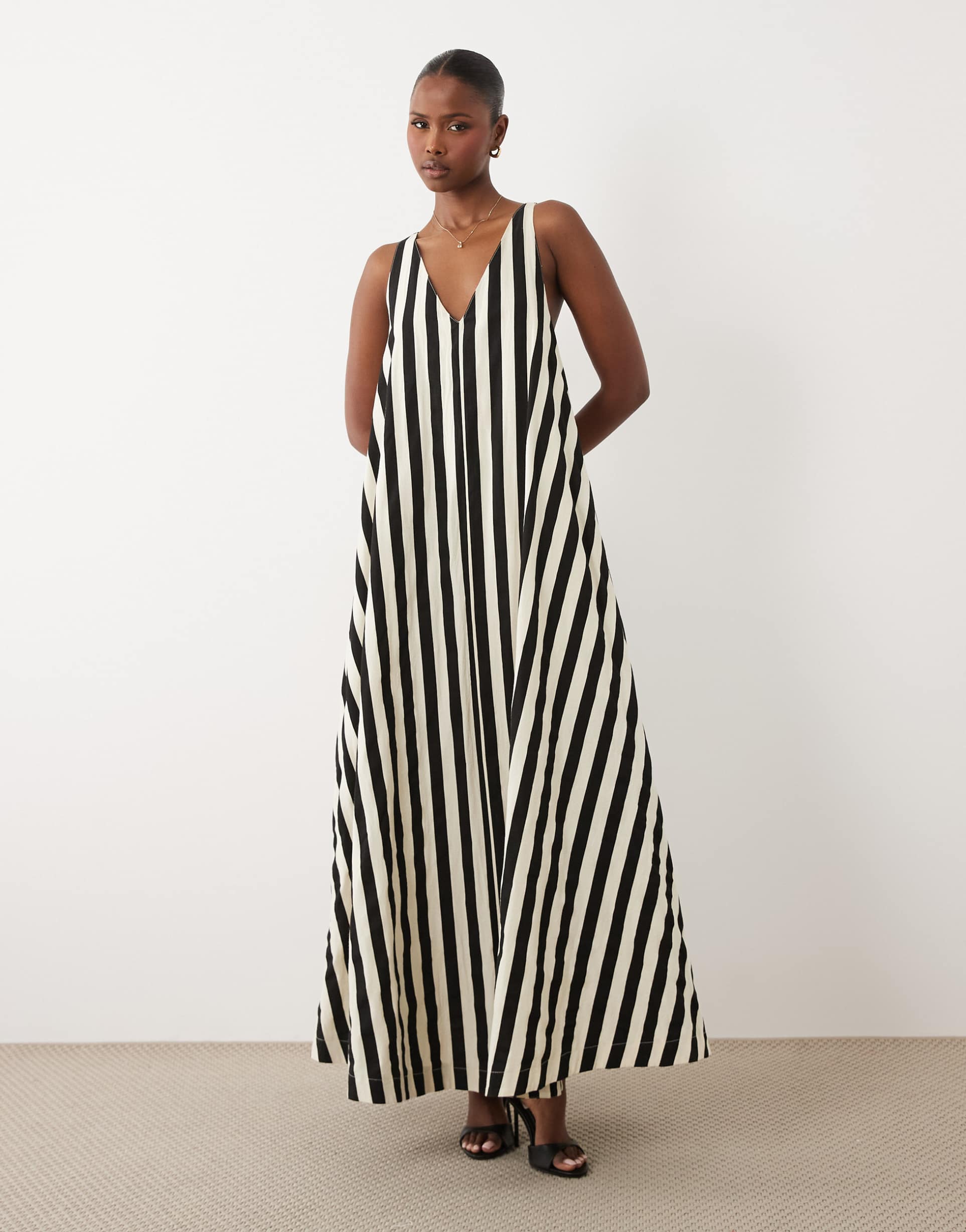 4th & reckless gold-tone hardware back detail trapeze maxi dress in black & white stripes