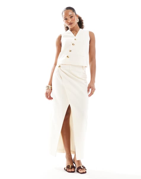 4th & Reckless – Kremowy zestaw: asymetryczna dopasowana kamizelka zapinana na złote guziki i spódnica maxi - view 1