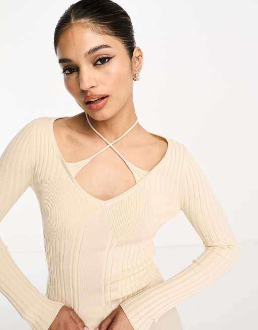 4th & Reckless - Lexie - Beige, ribbstickad topp med korsad design framtill