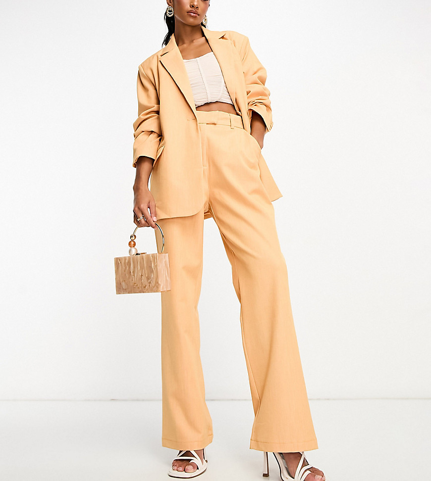 exclusive tailored pants in orange - part of a set