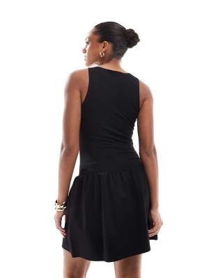 4th & reckless sleeveless racerneck drop waist mini dress in black