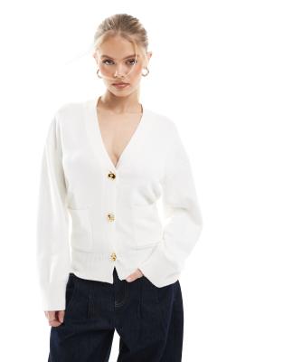 structured v neck gold button detail cardigan in cream-White