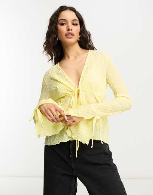 Yellow bell sleeves top by Rias