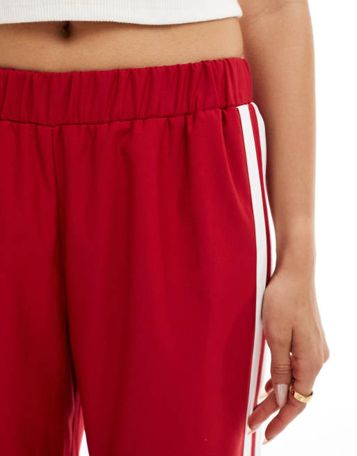 Red pants half stripe top