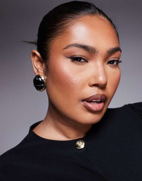 8 Other Reasons black resin stud earrings in gold - view 1