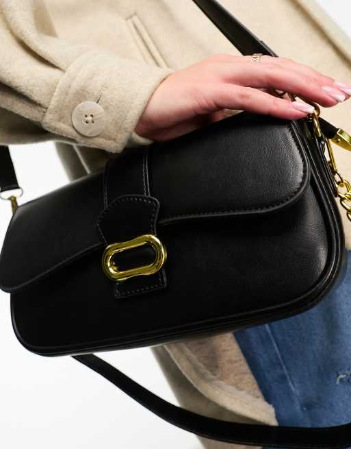 Truffle shoulder bag with gold hardware and chain strap in black