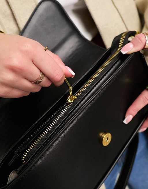 Black leather bag with gold online hardware