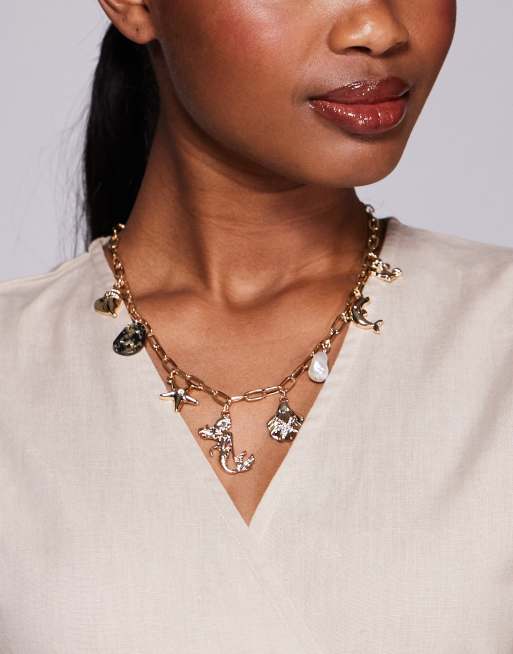 8 Other Reasons - Collana color oro con ciondoli a conchiglia e sirena