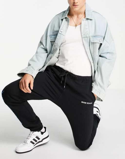 9N1M SENSE exclusive to ASOS co-ord joggers in black with cold as ice print, 4 of 4