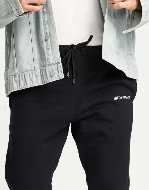9N1M SENSE – Jogginghose in Schwarz mit „Cold as ice“-Print, Kombiteil, exklusiv bei ASOS, 3 von 4