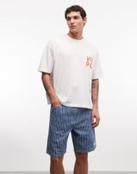 Aape by A Bathing Ape aape now striped denim jorts in blue and white