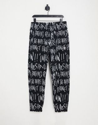 AAPE by A Bathing Ape all over print joggers in black