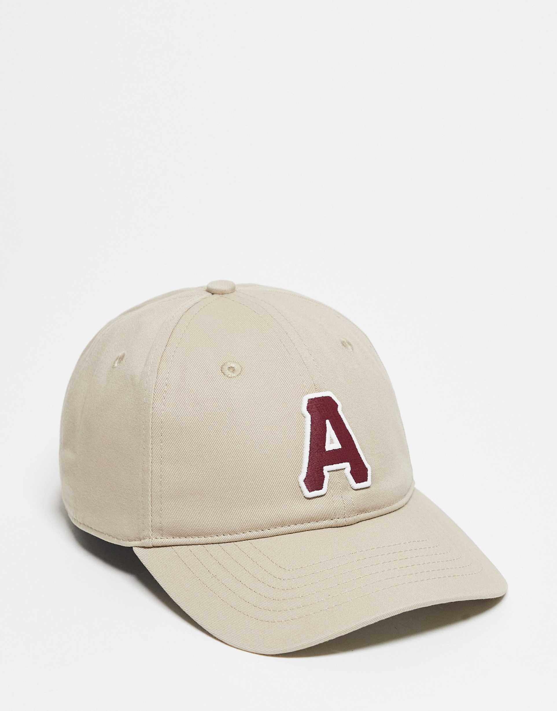 aape by a bathing ape baseball cap in beige