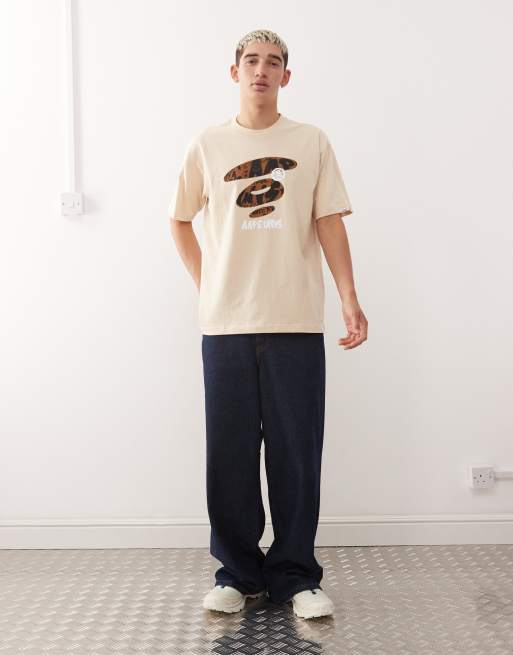 Aape by A Bathing Ape – Beige t-shirt i oversize med boxig passform och logga framtill, 2 av 5