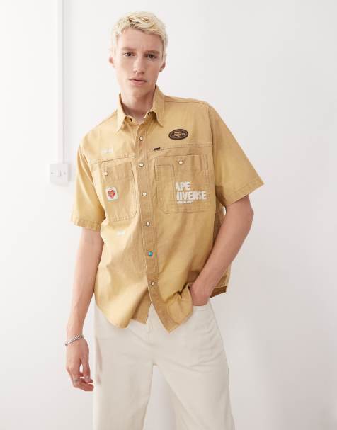 AAPE By A Bathing Ape – Beżowa koszula w stylu roboczym z krótkim rękawem i haftowanym wzorem na plecach - view 1