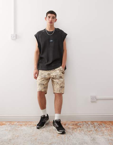 Aape by A Bathing Ape workwear carpenter shorts co-ord with all over rodeo print in beige