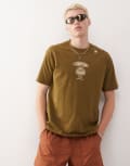 [AAPE BY A BATHING APE®] Aape by A Bathing Ape boxy fit t-shirt in khaki green with multi placement western print Chest 34 KHAKI