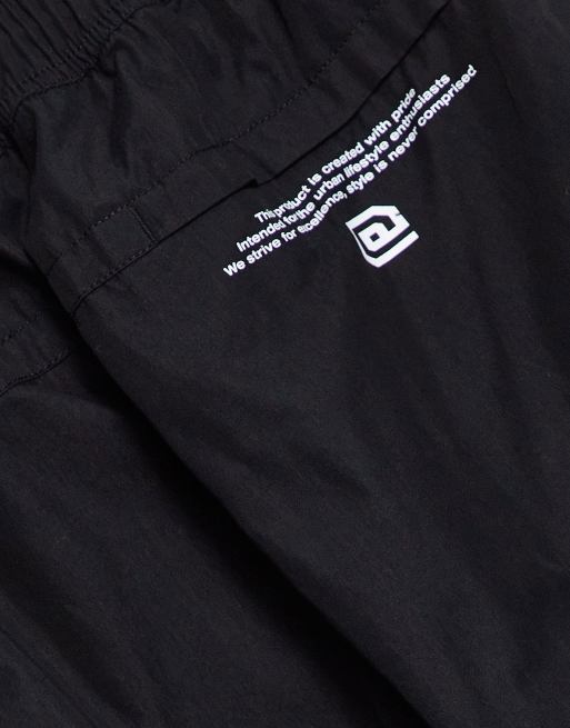 Aape By A Bathing Ape - Broek met verschillende cargozakken in zwart, 4 van 4