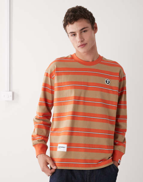 Aape by A Bathing Ape – Brun och orangerandig t-shirt med långa ärmar och boxig passform - view 1