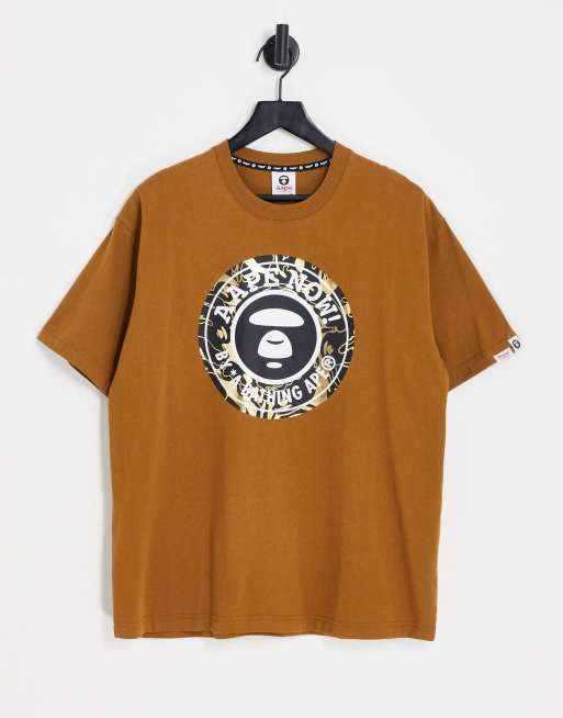 AAPE By A Bathing Ape – Brun t-shirt med kamouflagemönstrad logga