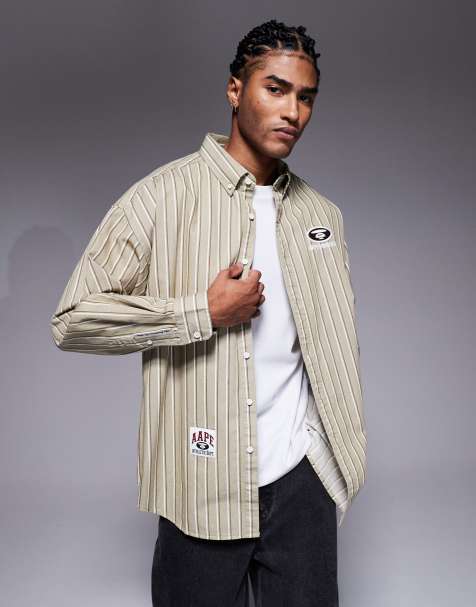 Aape by A Bathing Ape - Camicia oversize a maniche lunghe a righe con ricamo sul retro - view 1