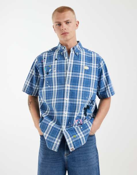 Aape by A Bathing Ape - camisa de manga corta a cuadros en azul y blanco con bajo salpicado - view 1