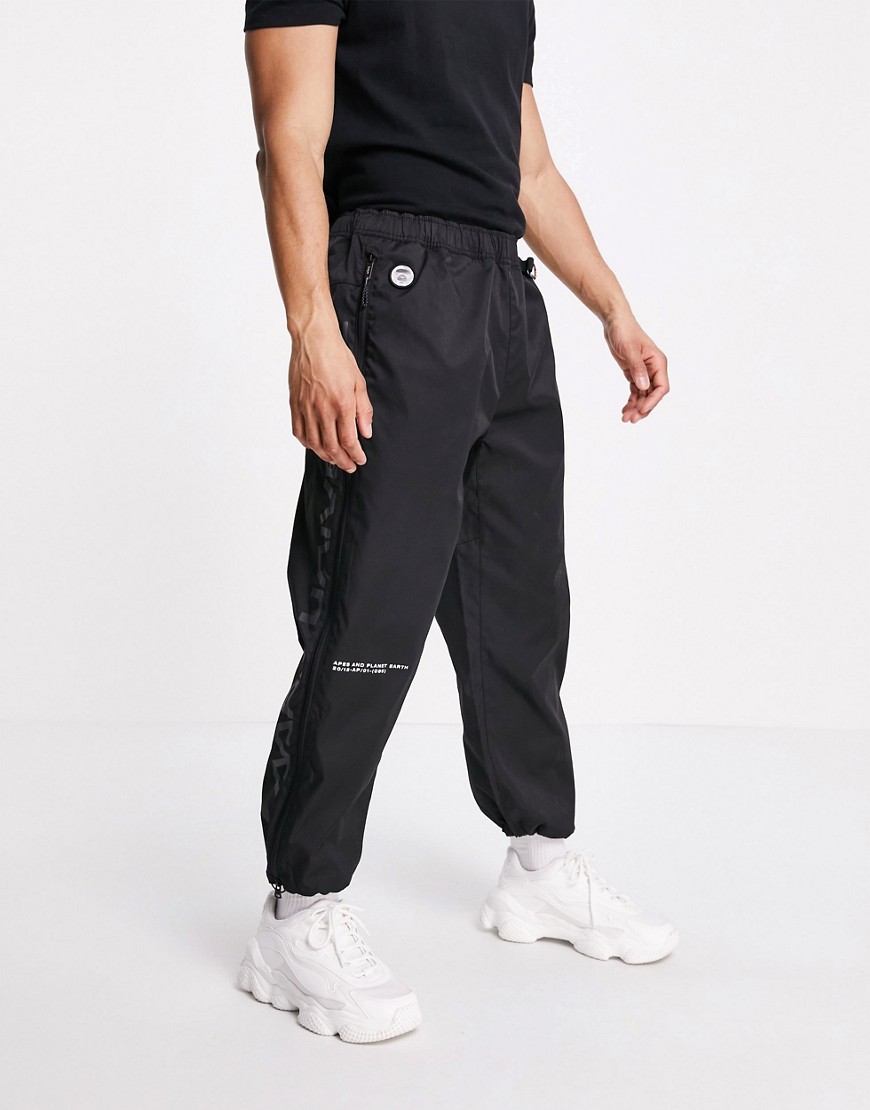 AAPE By A Bathing Ape casual nylon trousers with side zips in black