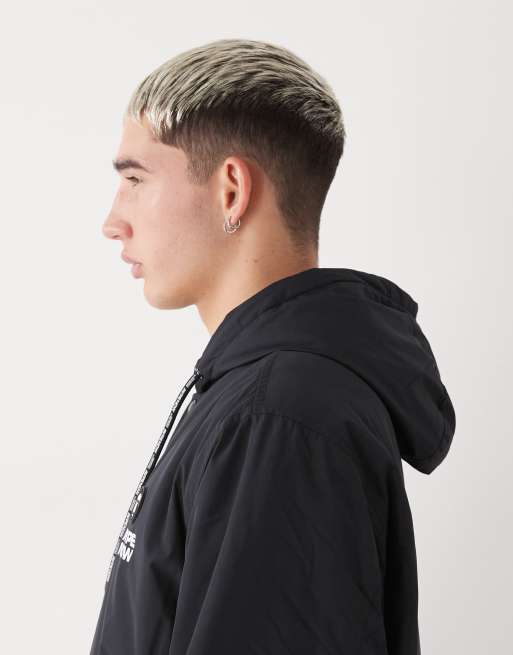 Aape by A Bathing Ape coach jacket in black with spine embroidery