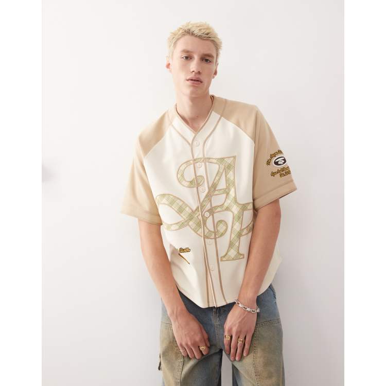 AAPE BY A BATHING APE college baseball T-shirt in beige | ASOS
