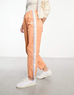 AAPE by A BATHING APE - College-Fallschirmhose in Orange