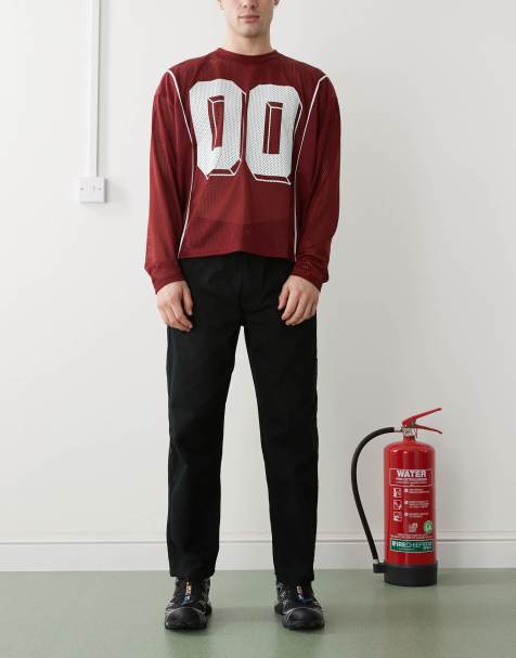 Aape by A Bathing Ape elastic waist straight leg logo jeans in black - view 1