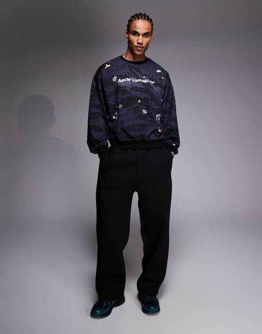 Aape by A Bathing Ape - Felpa nera mimetica con adesivi, 2 di 5