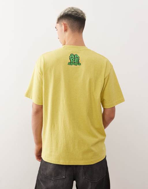 Aape by A Bathing Ape – Gul t-shirt med boxig passform och logga fram- och baktill, 3 av 5