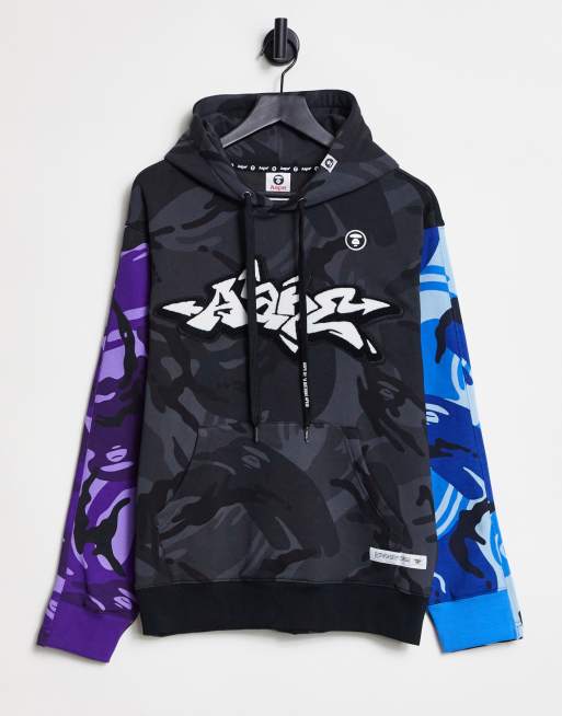 AAPE BY A BATHING APE® – Hollywood – Kapuzenpullover in Schwarz mit mehrfarbigem Military-Muster