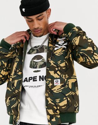 AAPE By A Bathing Ape hooded reversible bomber jacket in green | ASOS